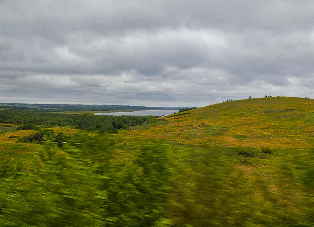 Crossing some 20 km into Saskatchewan we see a few rolling hills.  The lake in the distance is Manitou Lake.⠀
⠀
⠀
⠀
⠀
⠀
⠀
⠀
⠀
⠀
⠀
⠀
#naturewalks #naturescape #nature_photography #nature_love #naturestagram #natureisamazing #natureisawesome #naturephotograph #nature_obsession_landscapes #nature_lover #wildernesstones #wildernessvibes #wildernessnation #wildernesslife #wildernessquest #outdoorsociety #wunderlust #wunderlustphotography #exploreeverywhere #crosscanada #oh_canada #saskatchewanskies #saskatchewanphotography #saskatchewanscenery